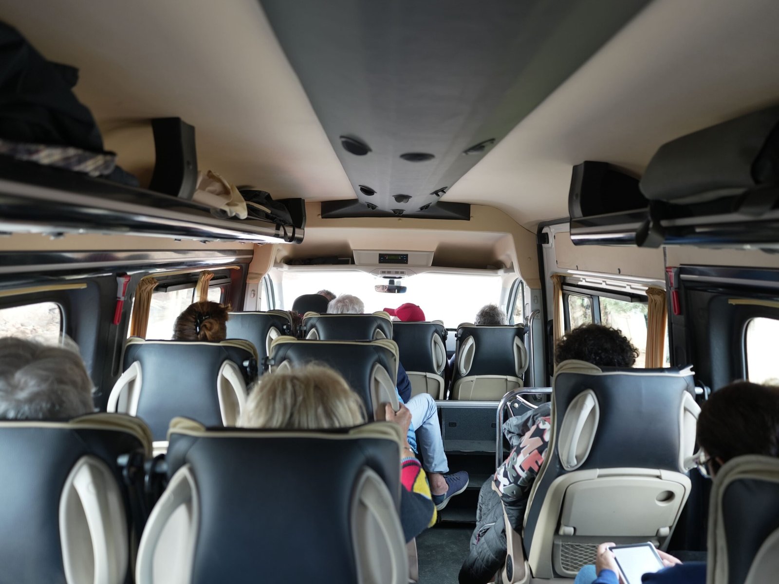 Comfortable tourist minibus transporting visitors during a guided tour in Morocco.